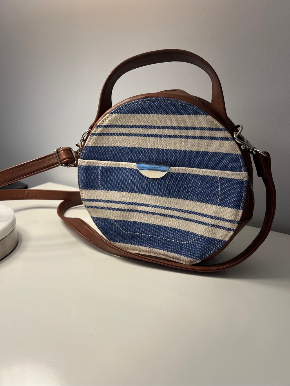 2/$7 Blue Striped Round Crossbody Bag with Brown Trim